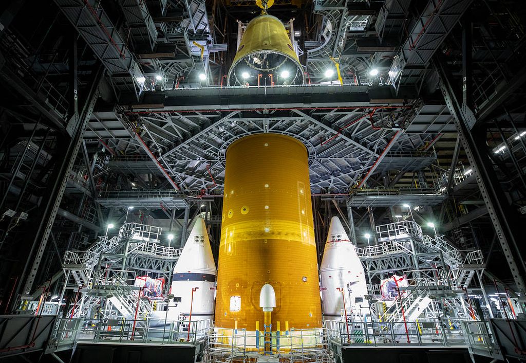 Crews with NASA’s Exploration Ground Systems and contractor Jacobs stacked the launch vehicle stage adapter atop the core stage on June 22, 2021  at the agency’s Kennedy Space Center in Florida in preparation for the Artemis I mission.