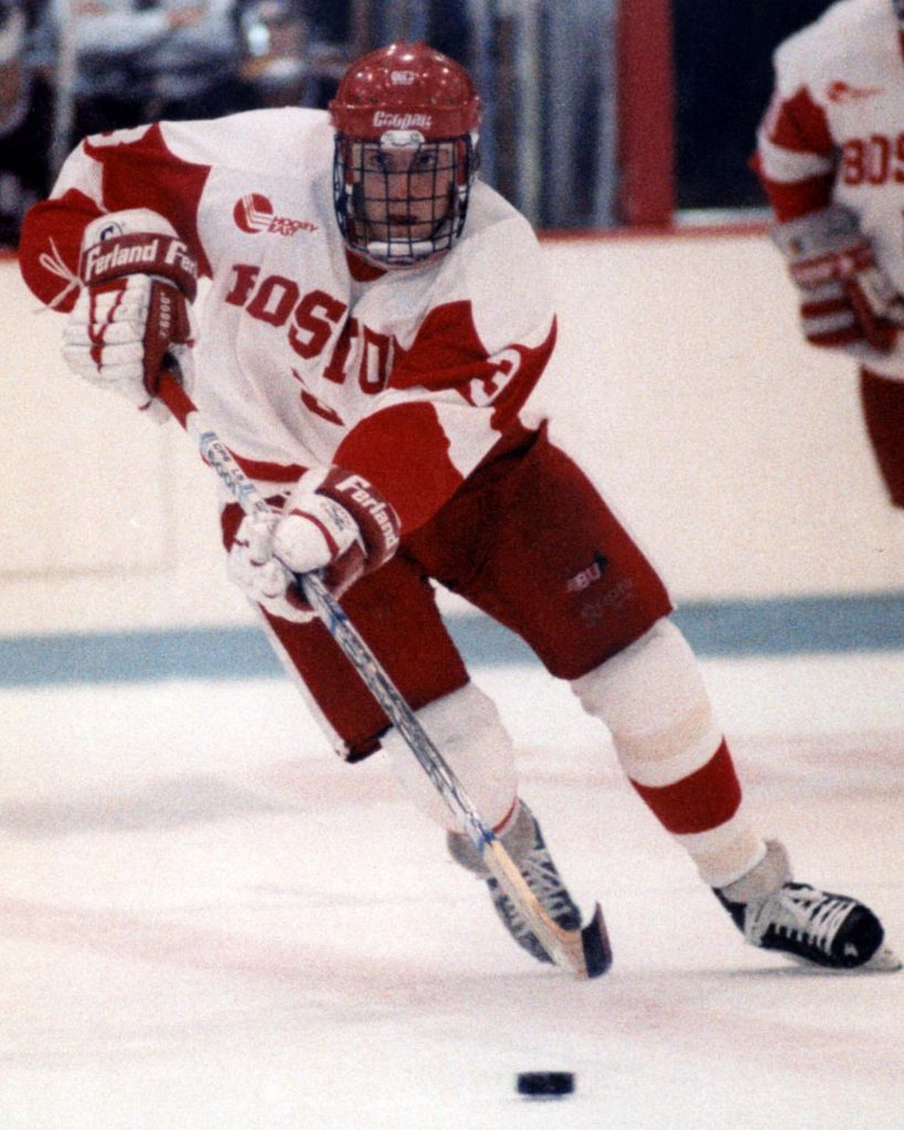 Photo of Tony Amonte, number 3, skating during a game during the 90-91 season.