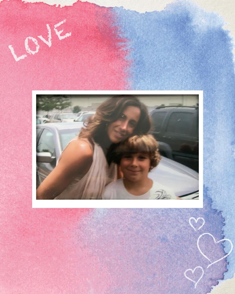 Vintage looking photo of Maria Riccitelli and her son as a young boy, smiling in what looks like a parking lot. The photo has a white border, similar to that of a polaroid, and is on a background with a pink and blue watercolor blob. “Love” is written on the left of the blob, white hearts are overlaid as well.