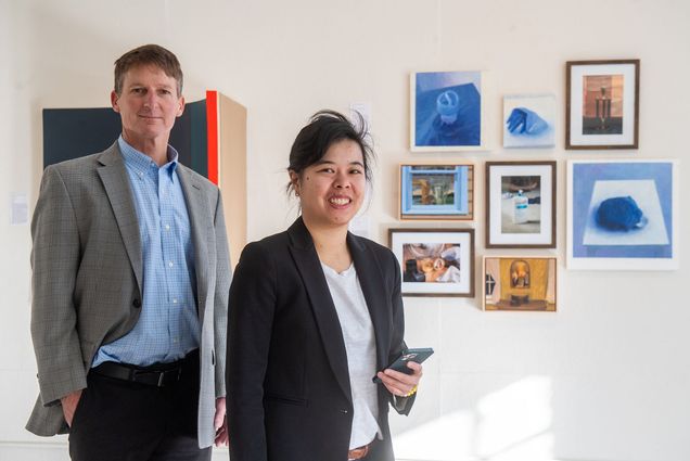 Emily Lam (ENG'14,'16,'20) and ENG Professor Thomas Little started tech company Rtangent, whose technology provides virtual tours led by a a live interpreter/guide. They were photographed at Gallery 263 in Cambridge, for which they created a tour. Photo by Cydney Scott for Boston University Photography