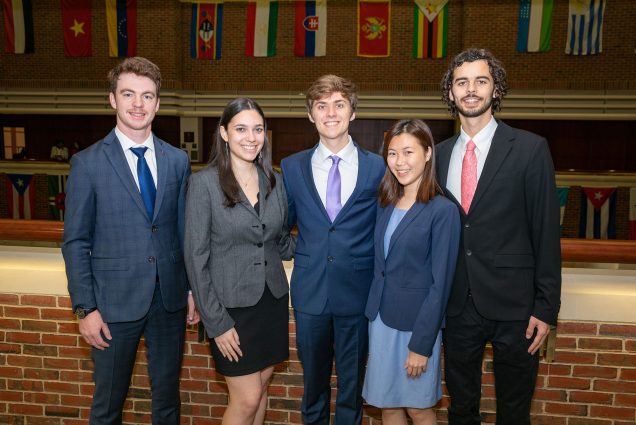 Group photo of the BU students who made it to the finals of a Questrom sustainability competition: (from left) Ryan Loughran (Questrom’24) (from left), Rachel Levine (Questrom’24), James Coyle (CAS’24), Rachel Koh (Questrom’24), and Noah Sorin (Questrom’24). They all wear business casual outfits and smile.