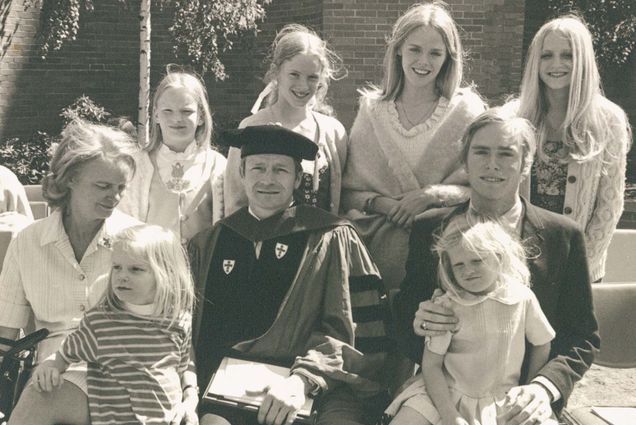 A family photo of the Silber's at the 1971 Boston University Commencement. The family's first Boston University Commencement and John Silber's inauguration as president. Front row, left to right: Kathryn, Laura Ruth, John, and David holding Caroline. Back row: Martha, Alexandra, Rachel, and Judith. Boston University Photography