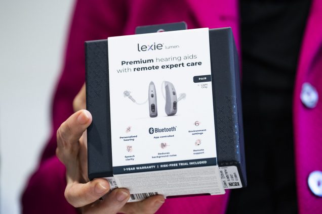 A box containing a pair of over-the-counter Lexie Lumen hearing aids. (Photo by AP Images)