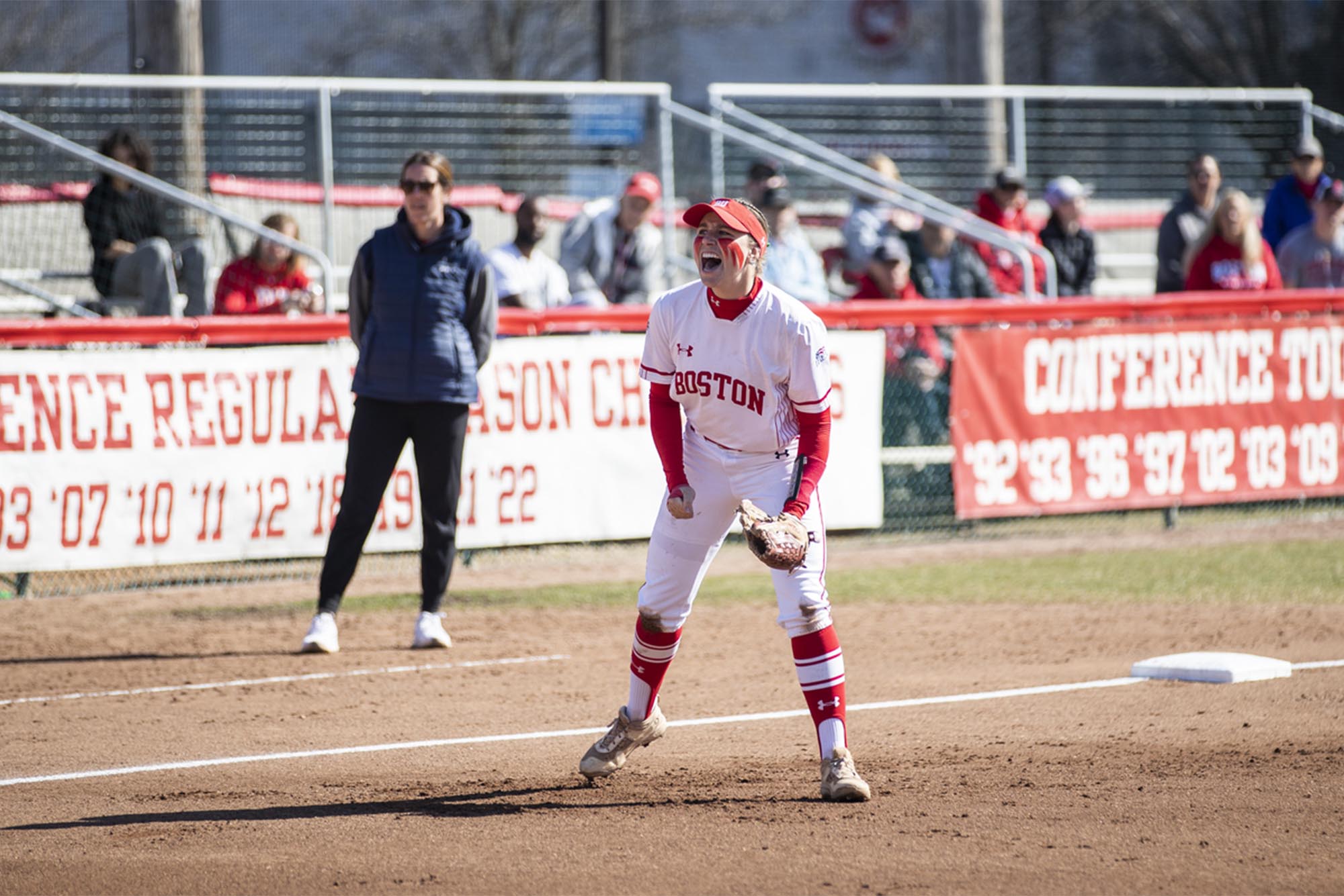 Photo: A Boston University Women's Softball player, Infielder Caitlin Coker, celebrates near 3rd base during a recent game