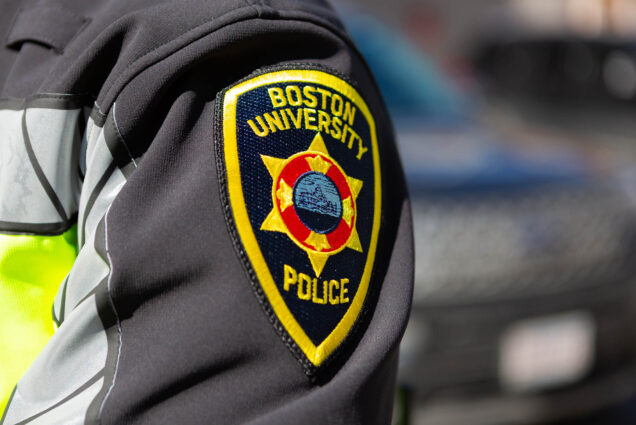 Photo: A closeup photo of a patch on a Boston University Police Department arm.