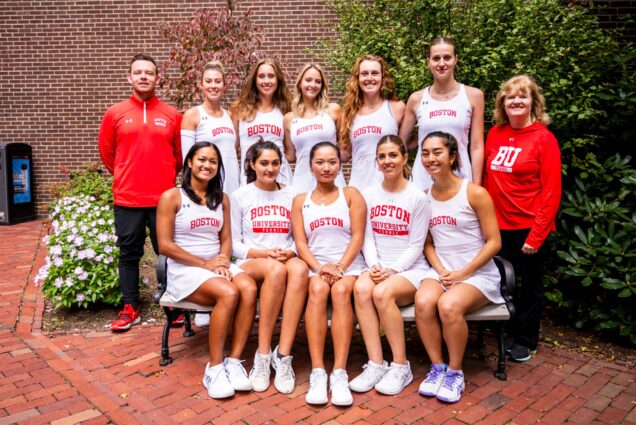 Photo: The BU Women's Tennis team poses for a team photo, with players in uniform and coaches at their sides