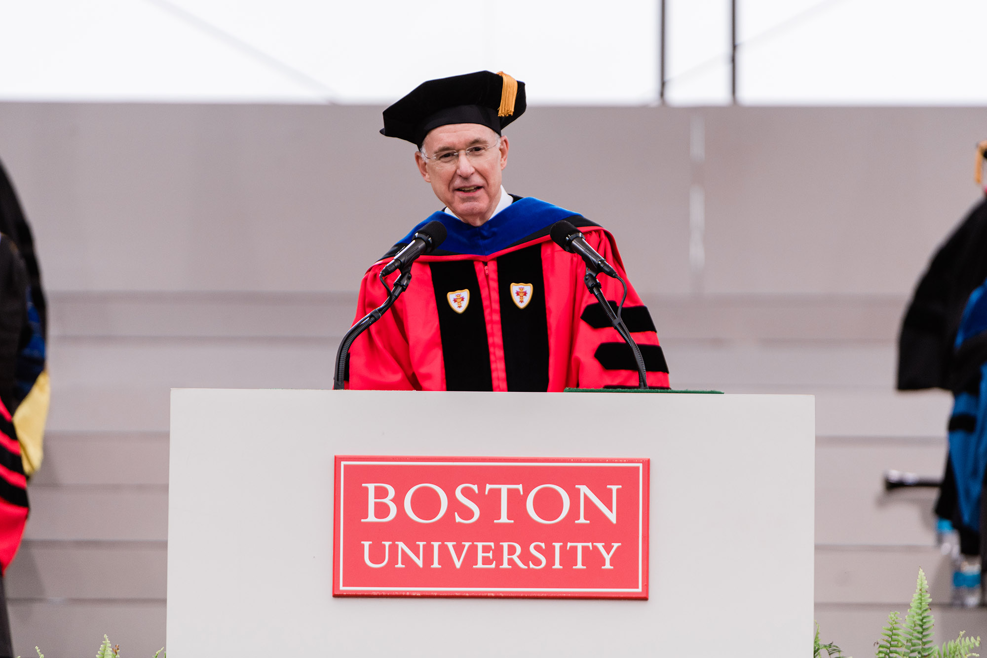 Photo: Boston University President Ad Interim Kenneth Freeman speaks during the 2024 Boston University Commencement at Nickerson Field on May 19, 2024.