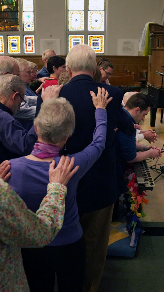 Photo: A church full of people during a busy sunday worship at a methodist service