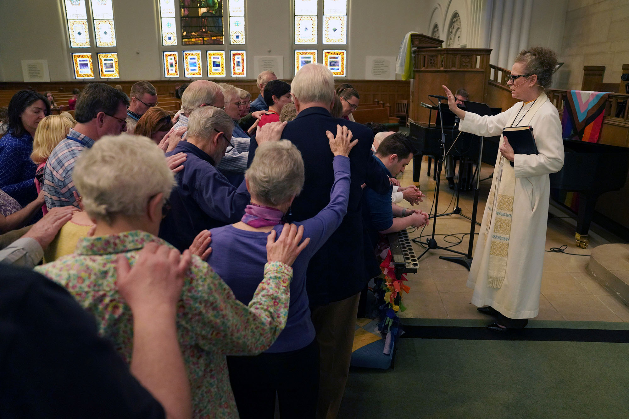 Photo: A church full of people during a busy sunday worship at a methodist service