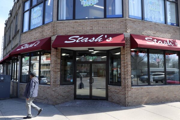 Photo: Exterior of a Pizza restaurant in Boston called Stashs, which has a red awning bearing the name in white text