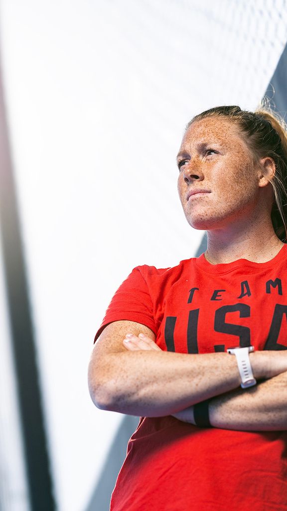 Photo: Ally Hammel, a white woman with a red tshirt, poses for a photo prior to the match against Argentina at the University of North Carolina