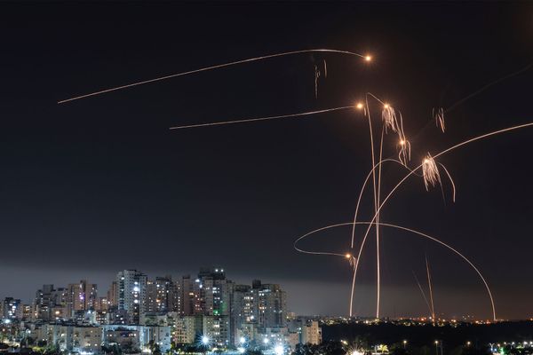 Israel's Iron Dome missile defense system fires interceptors at rockets launched from the Gaza Strip, in Ashkelon, southern Israel. Thursday, May 11, 2023.