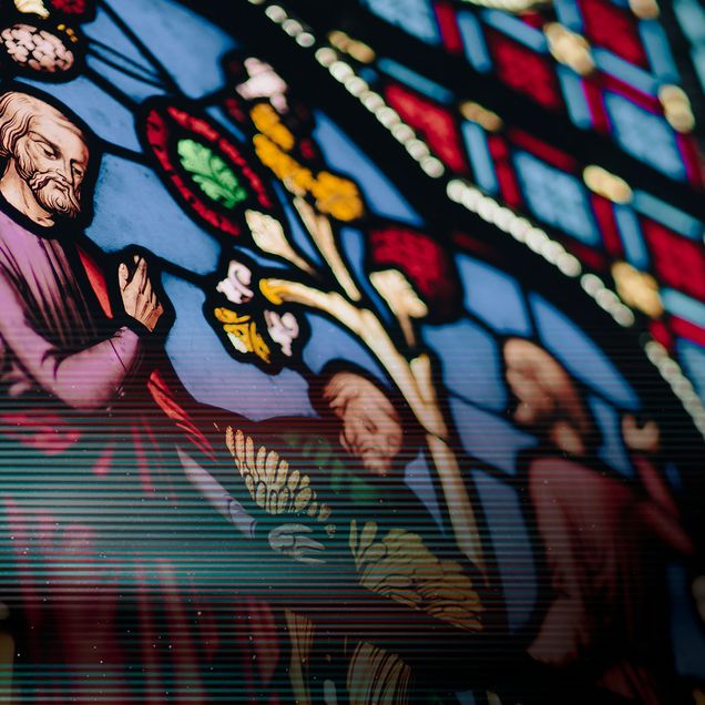 Photo: An elegant and colorful stained glass window in a church