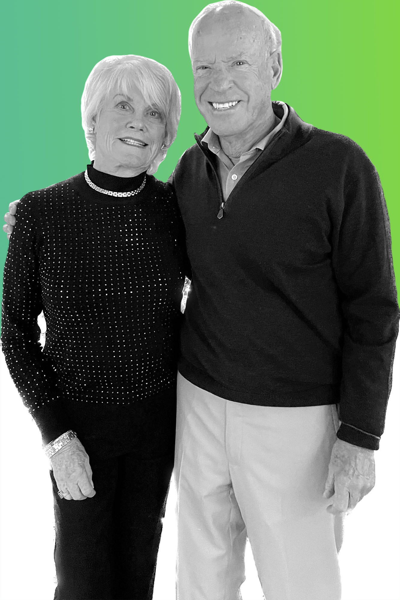 Photo: A couple in black and white overlay with a radiant green background.