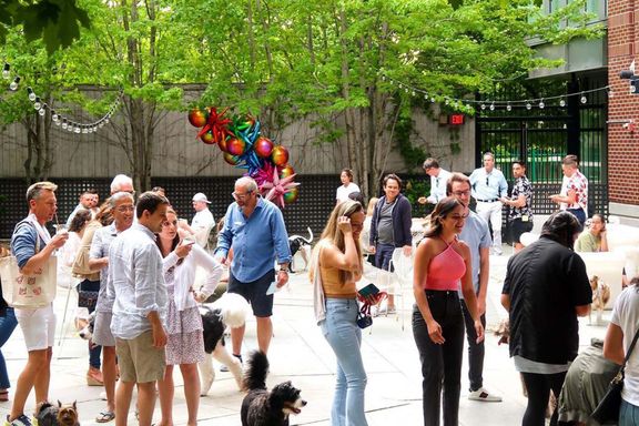 Photo: A picture of an outdoor socializing event called "Yappier Hour" at the Liberty Hotel