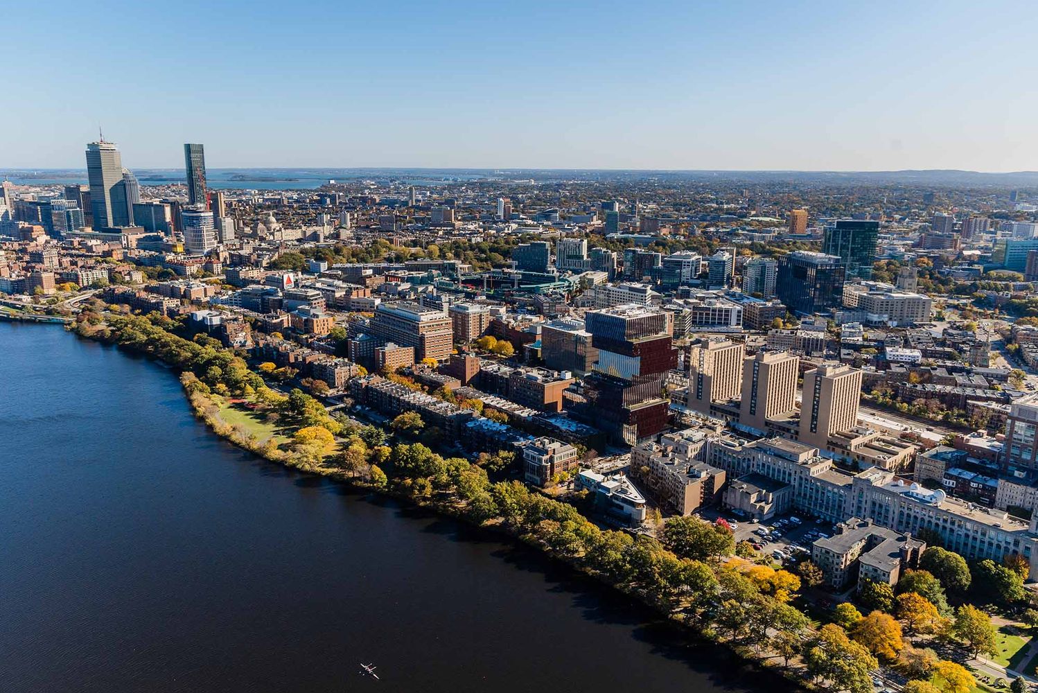 Photo: An aerial view of Boston University, featuring fall foliage and a view of the Charles River