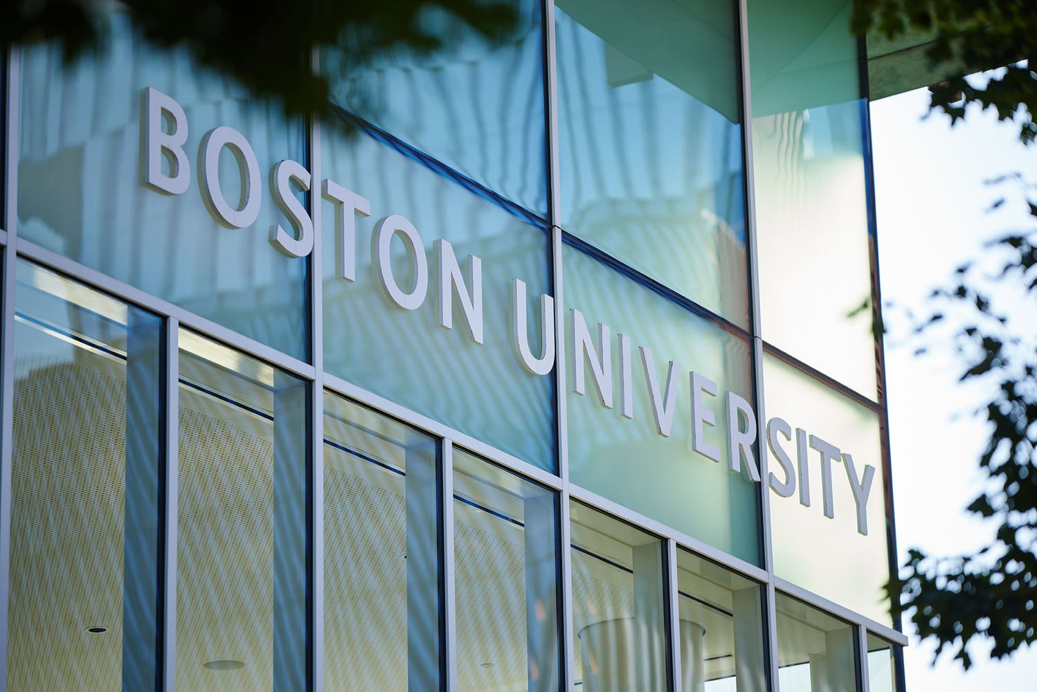 Photo: The side of a glass building with the words "Boston University" on it