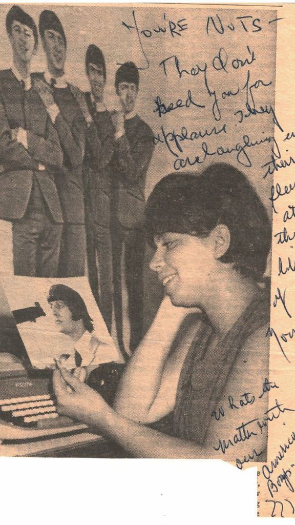 Photo: A scan of hate mail that Debbie Gendler recieved. It is a picture of her admiring a photo of The Beatles with handwriting over it. The writing says "You're nuts. They don't need you for applause. What's the matter with our American boys?"