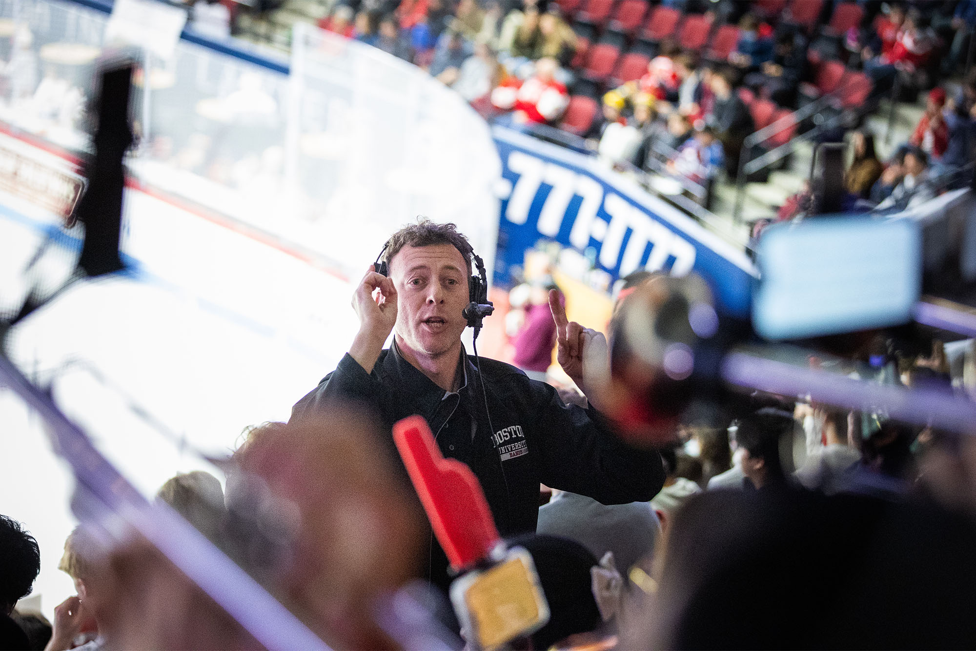 Aaron Goldberg leads the BU Athletics Bands as they play for the Terriers Hockey Team as they beat Merrimack College at the Agganis Arena November 22, 2024.Photo by Eric Haynes