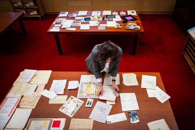 Photo: Jennifer Gunter King, associate university librarian, goes through papers that were donated by Dorothy Gilliam, the president's mother, who was a trailblazing journalist.