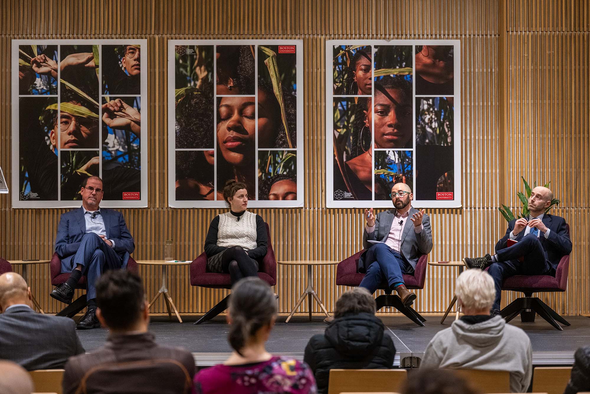 Photo: A panel of people having a discussion in front of a live audience