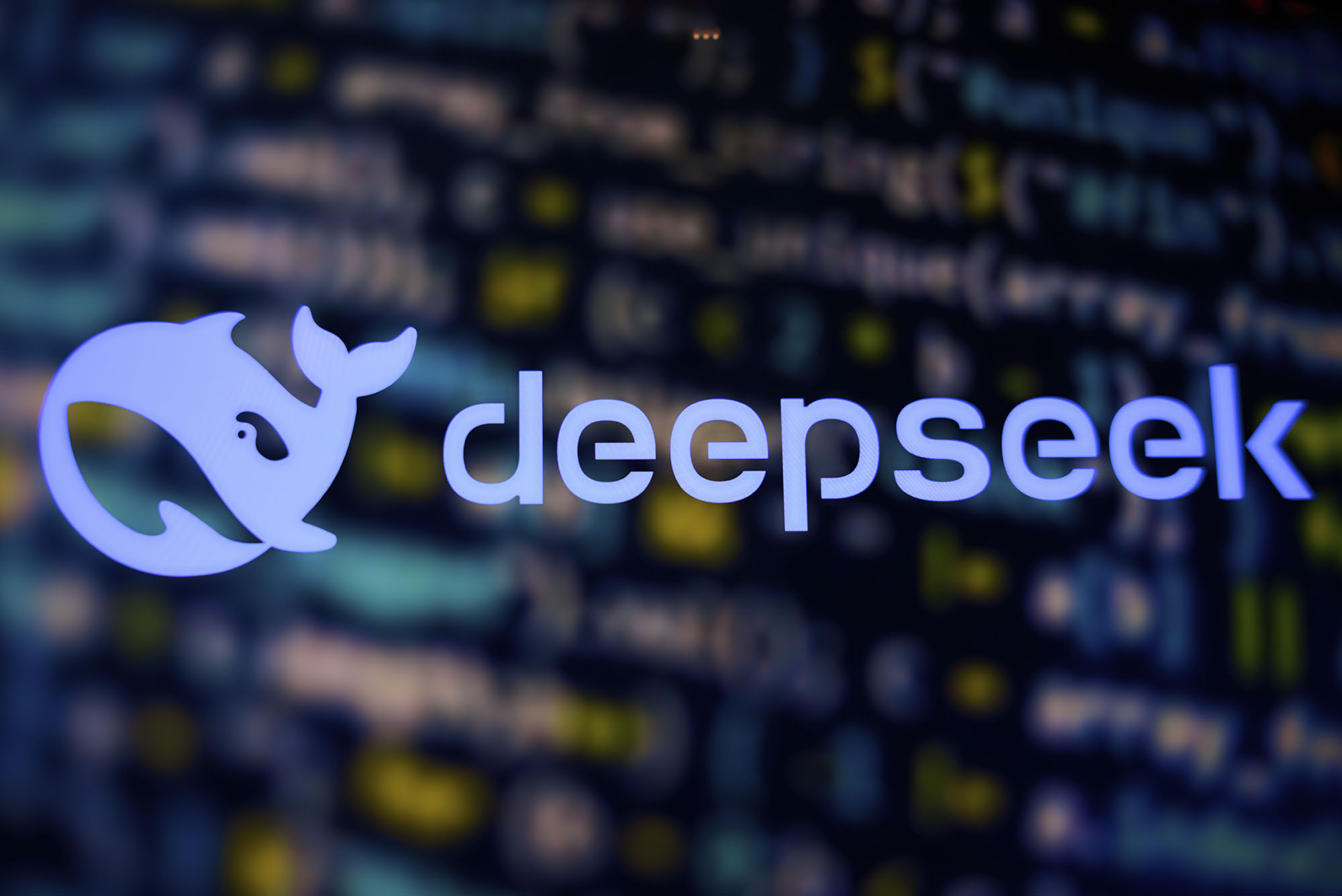 Photo: The logo of DeepSeek overlayed on a pixel background