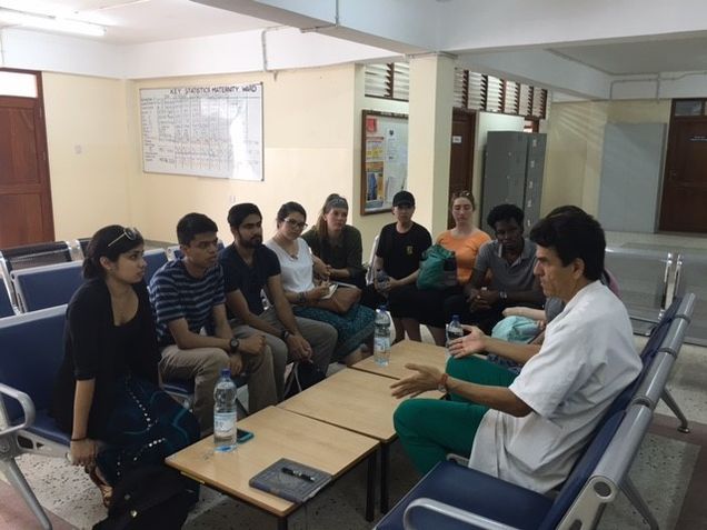 Students talking with physicians at Mnazi Mmoja Hospital, Zanzibar