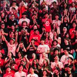 Photo: A sea of college students wearing red Boston University gear at Matriculation 2024.