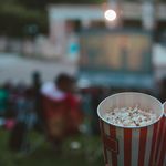 Photo: Two buckets of popcorn up close and to the bottom right hand side of the photo.