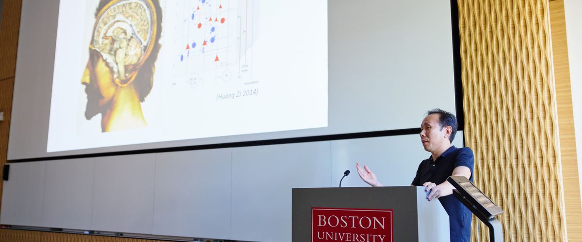 Jerry Chen behind podium