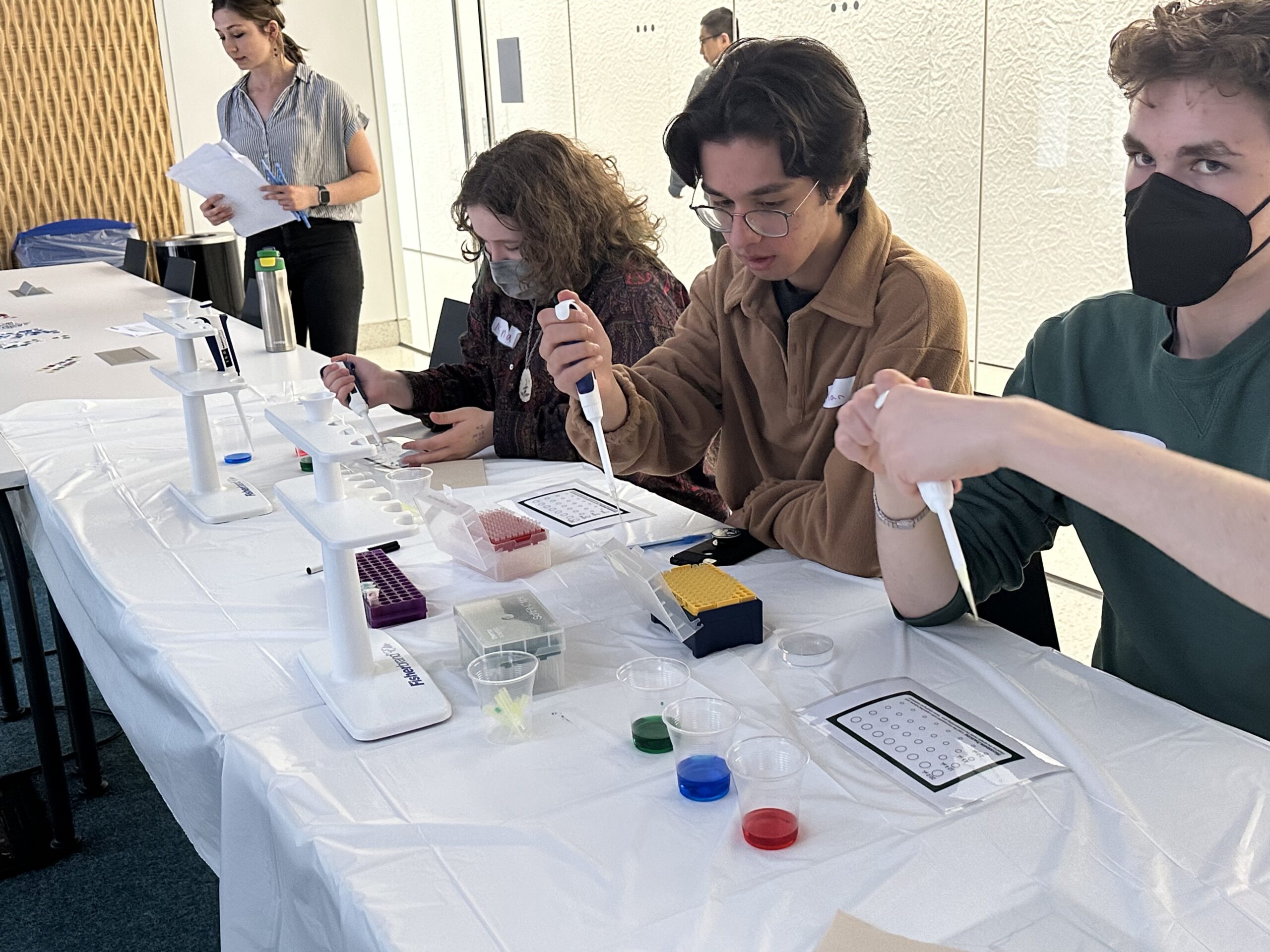 Students in STEM Pathways program pipetting