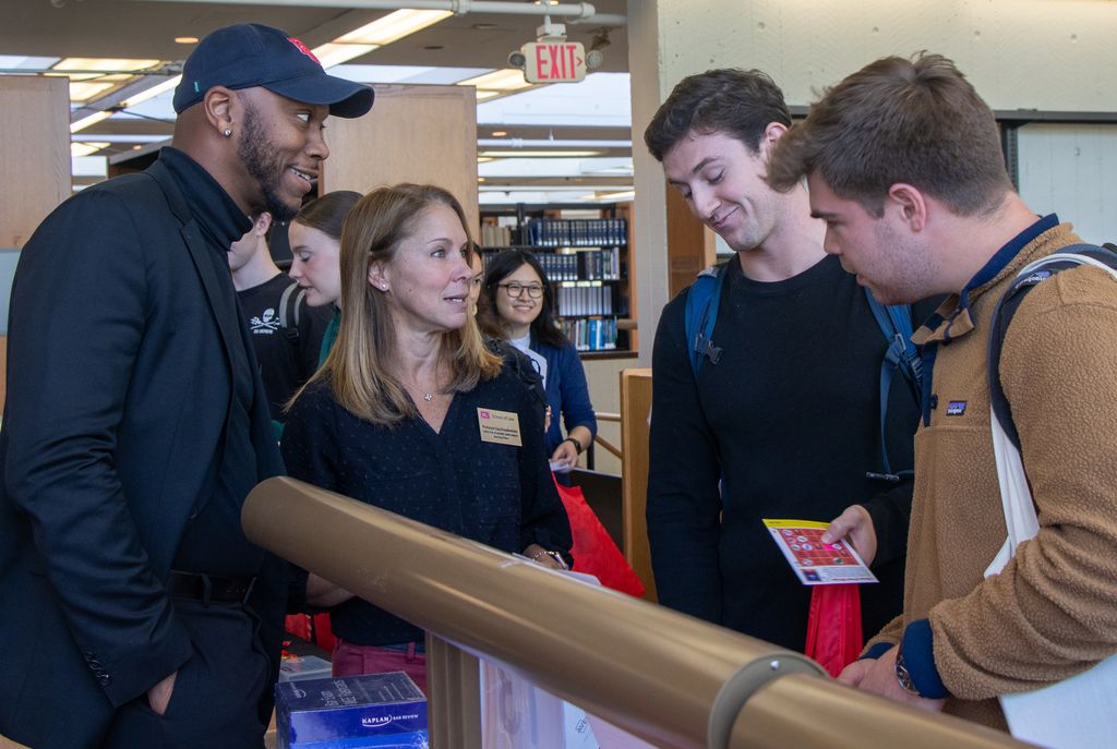 TL Gray and Lisa Freudenheim meet with students during BU Law's annual LibraryFest.