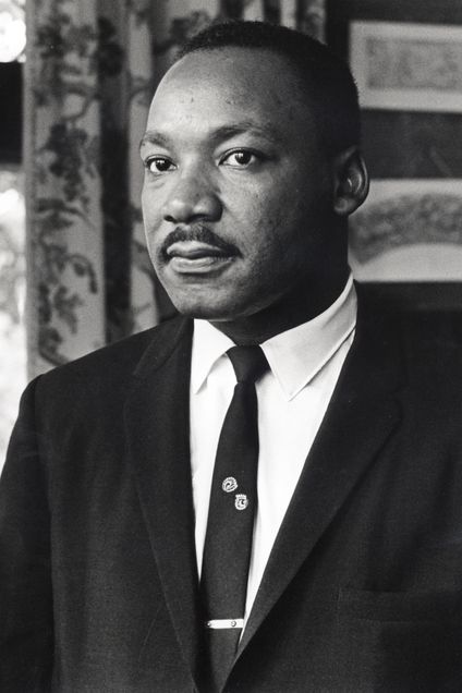 A black and white photo of Dr. Martin Luther King Jr.