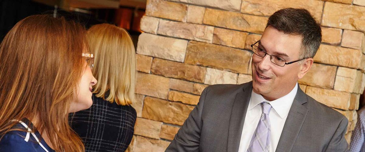 BU Met Professor Shea Cronin having a conversation.