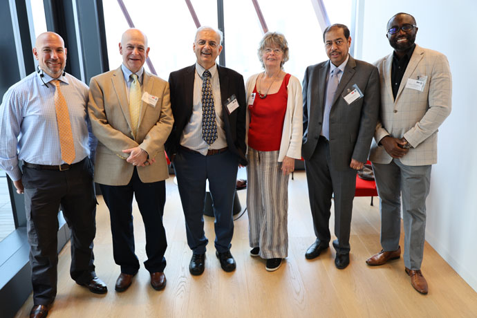 A group photo of the PMIP 2024 conference team, including Project Management program director Vijay Kanabar and Master Lecturer Richard Maltzman