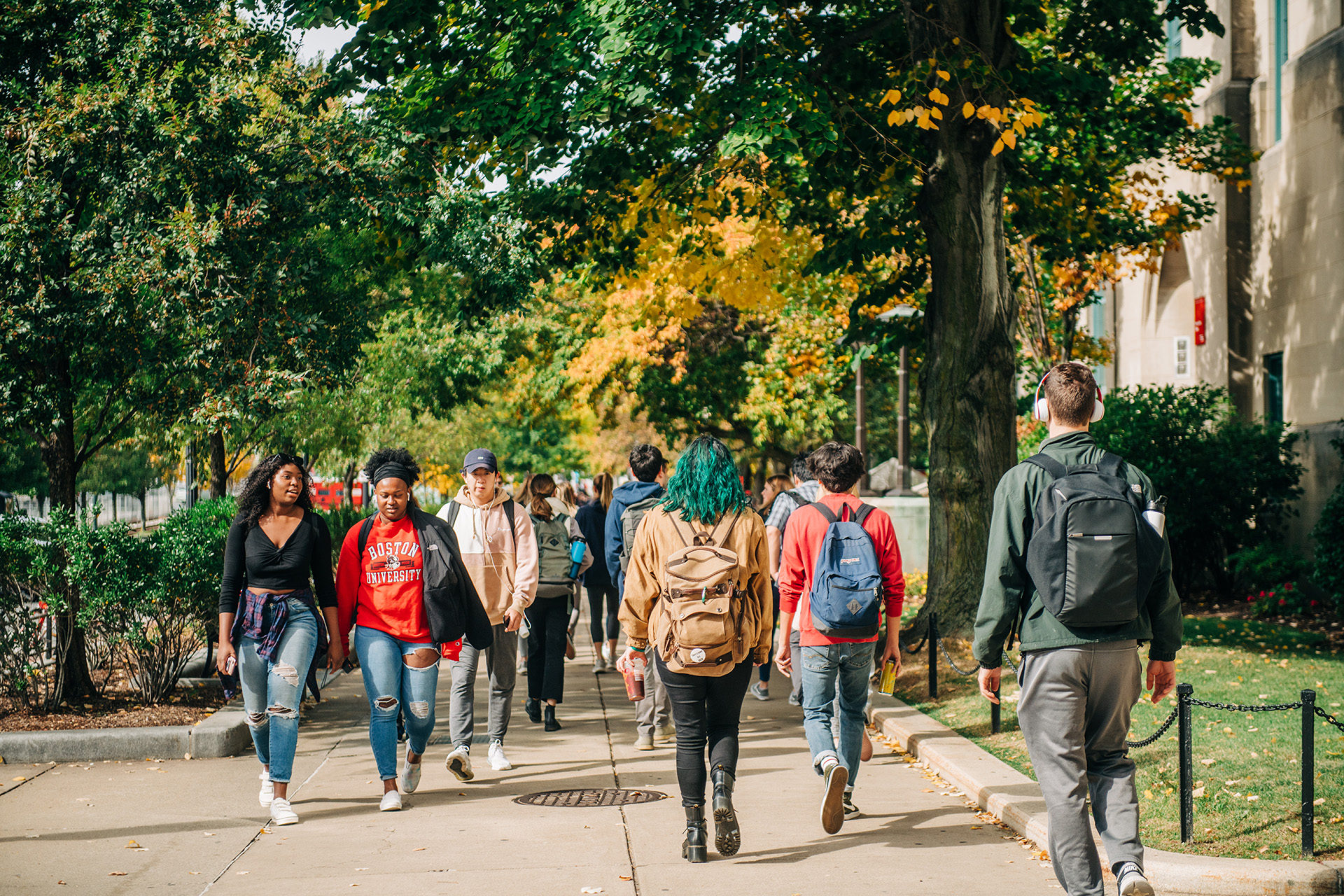 BU Students walking down Comm ave during the fall.