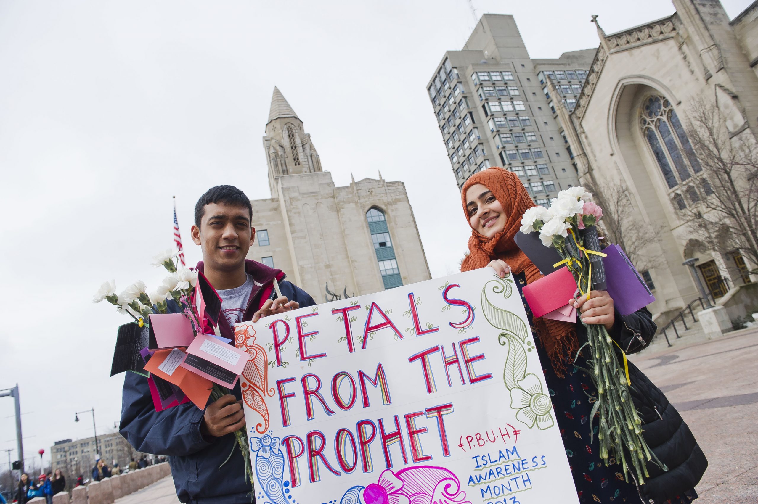 “Petals from the Prophet” Muslim students hand out flowers on Marsh Plaza for Islam Awareness Month.