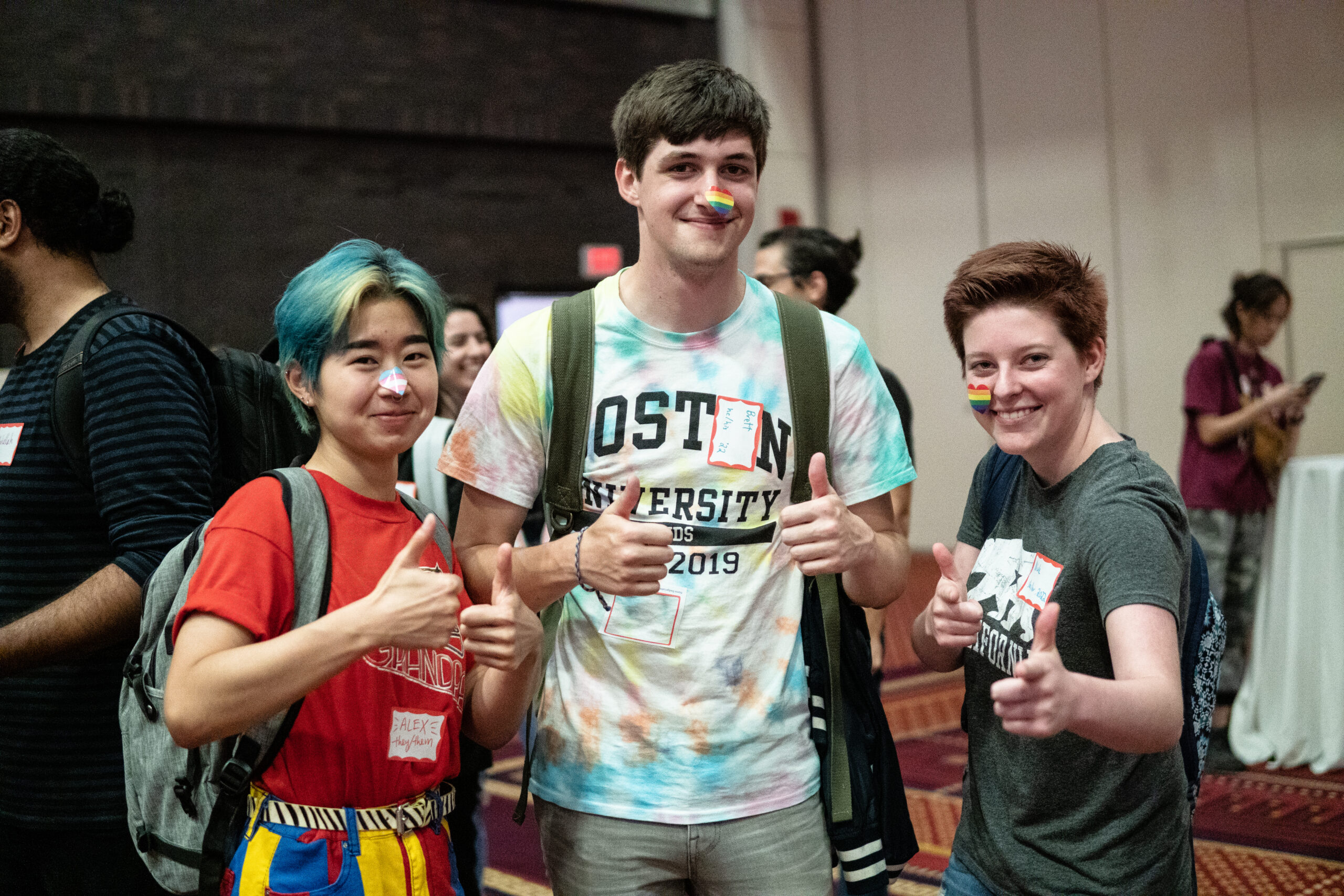 The Howard Thurman Center for Common Ground hosted the LGBTQ+ Community Welcome Reception in collaboration with the Center for Gender, Sexuality and Activism (CGSA) as part of BU's Weeks of Welcome on September 11, 2019. Alex Pan (COM'22) (from left), Bret Lavelle (COM'22), and Nicole Beymer (CAS'22) were among the many students and faculty that came to the event.