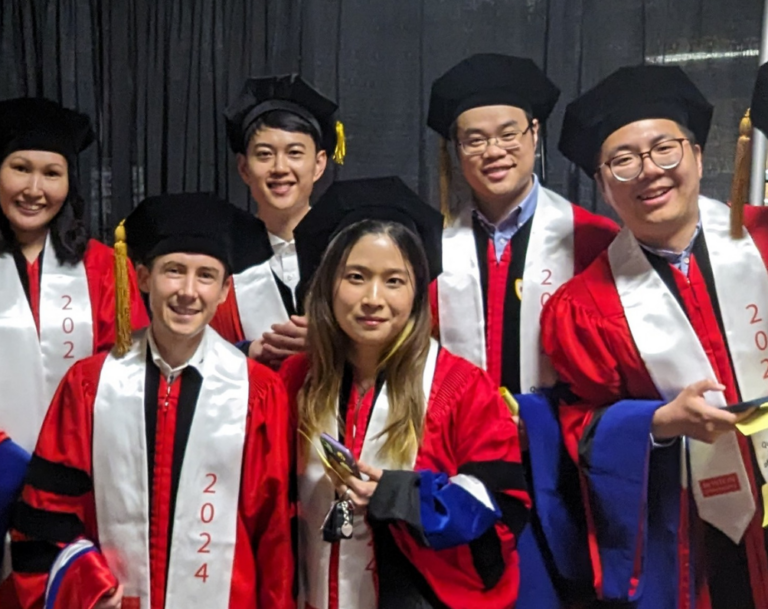 Group of PhD Graduates posing for photo