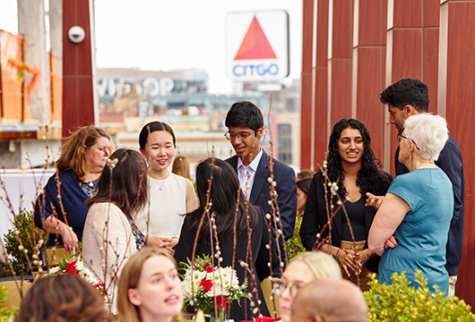 Group of students mingling at event