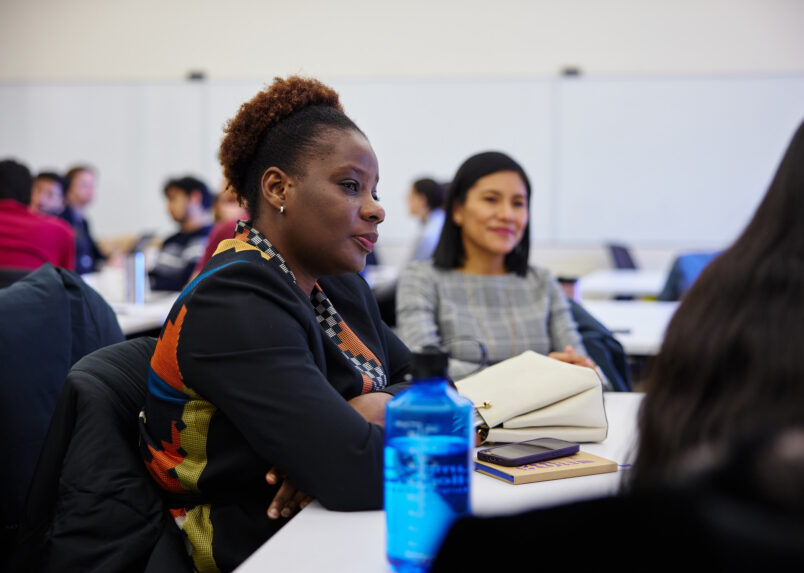 Woman listening to lecture