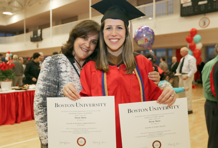 Graduate and family posing with diploma