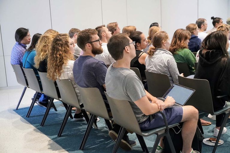 Students listening to presentation