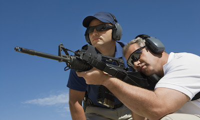 Two friends at a firing range - most gun owners support gun violence prevention policies