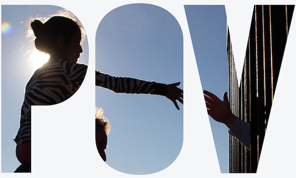 Letters POV filled in with picture of a child reaching out for a hand on the other side of the border wall with Mexico