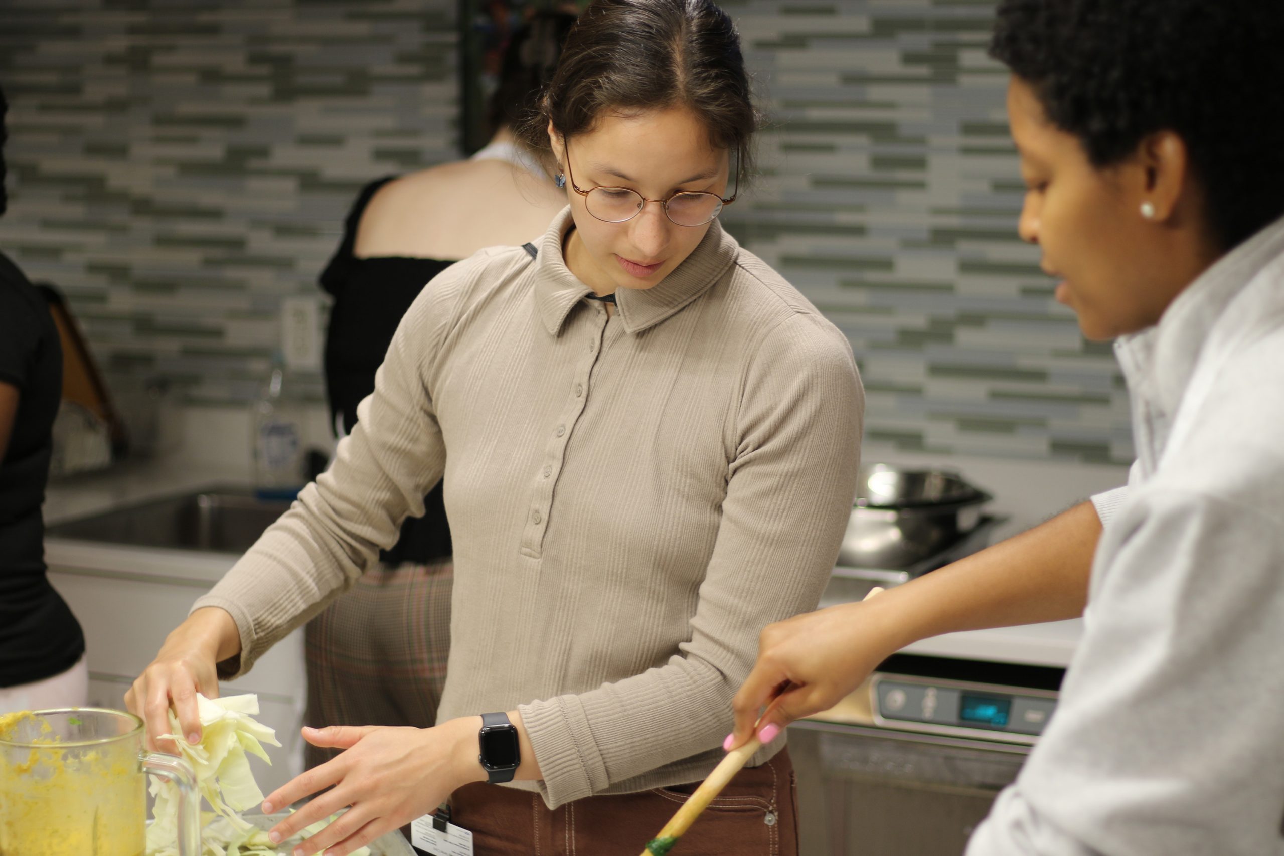 Students participate in a cooking class