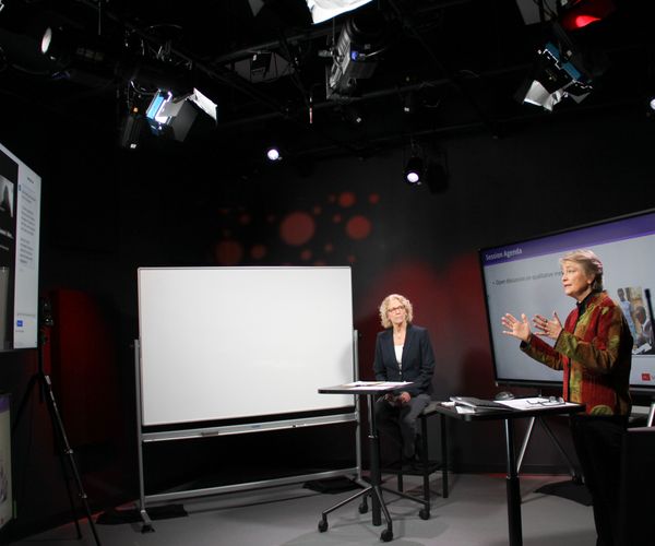 Lisa Sullivan (left), associate dean for education, and Lora Sabin (right), associate professor of global health, speak with Online MPH students over Zoom from the BU Virtual studio where SPH faculty record instructional content and hold weekly live sessions.