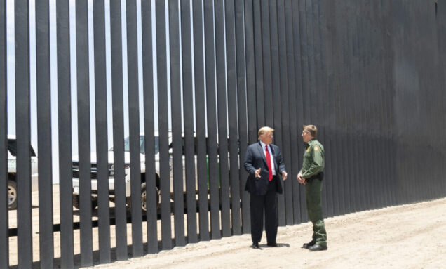 Trump stands beside the border wall with Mexico