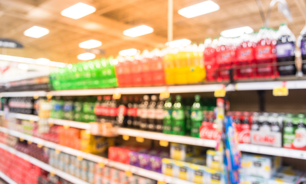 Abstract blurred soft drinks aisle in American store