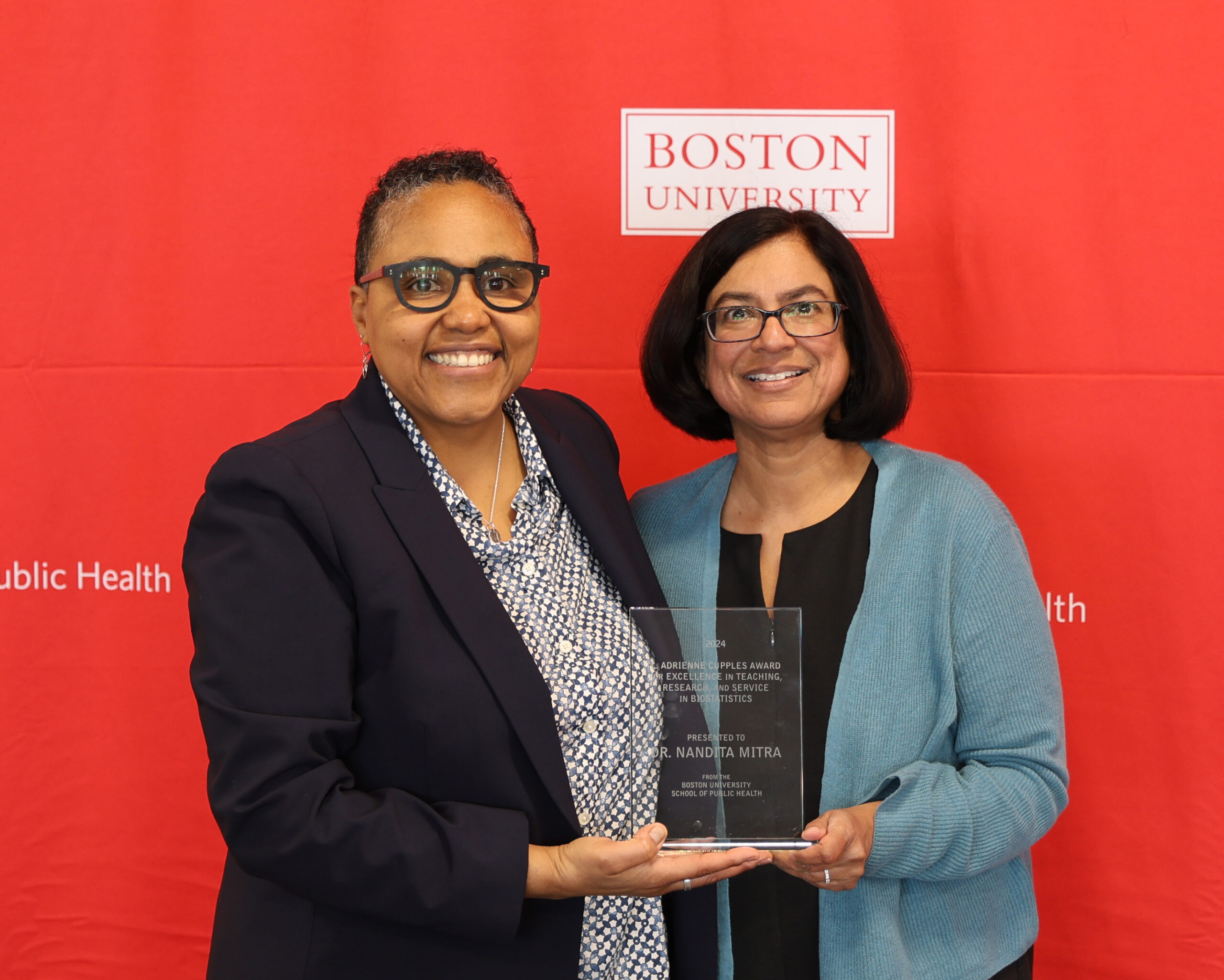 Scarlett Bellamy presents award to Dr Nandita Mitra